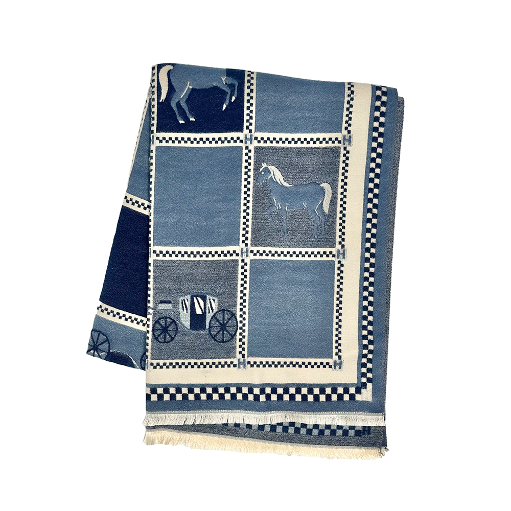 Decorative throw blanket with horse and carriage pattern on a white background