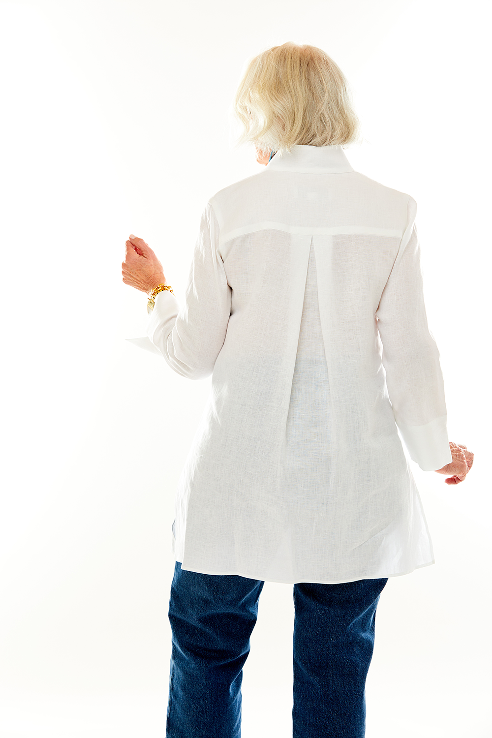Woman in white tunic