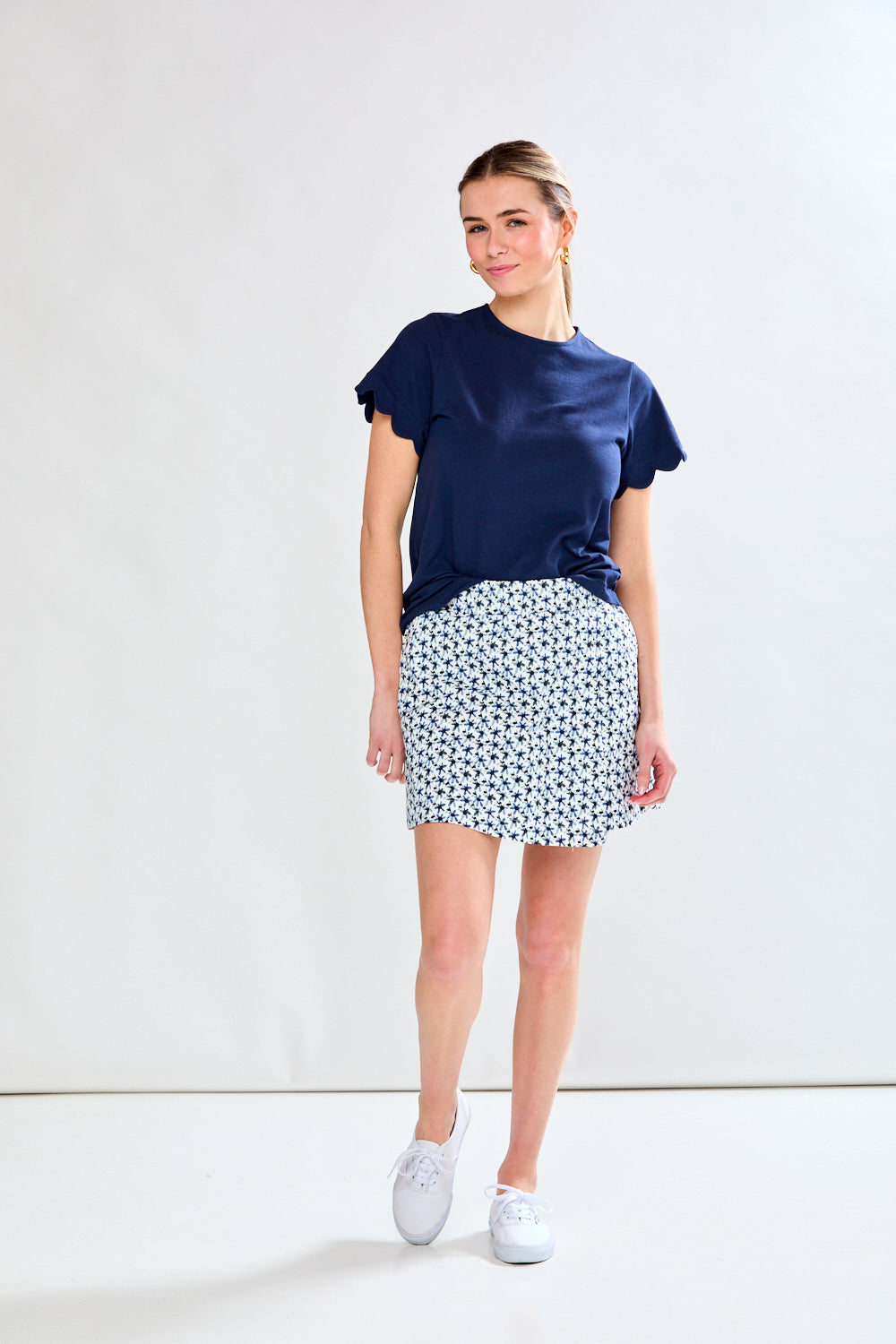 Woman in blue printed skort