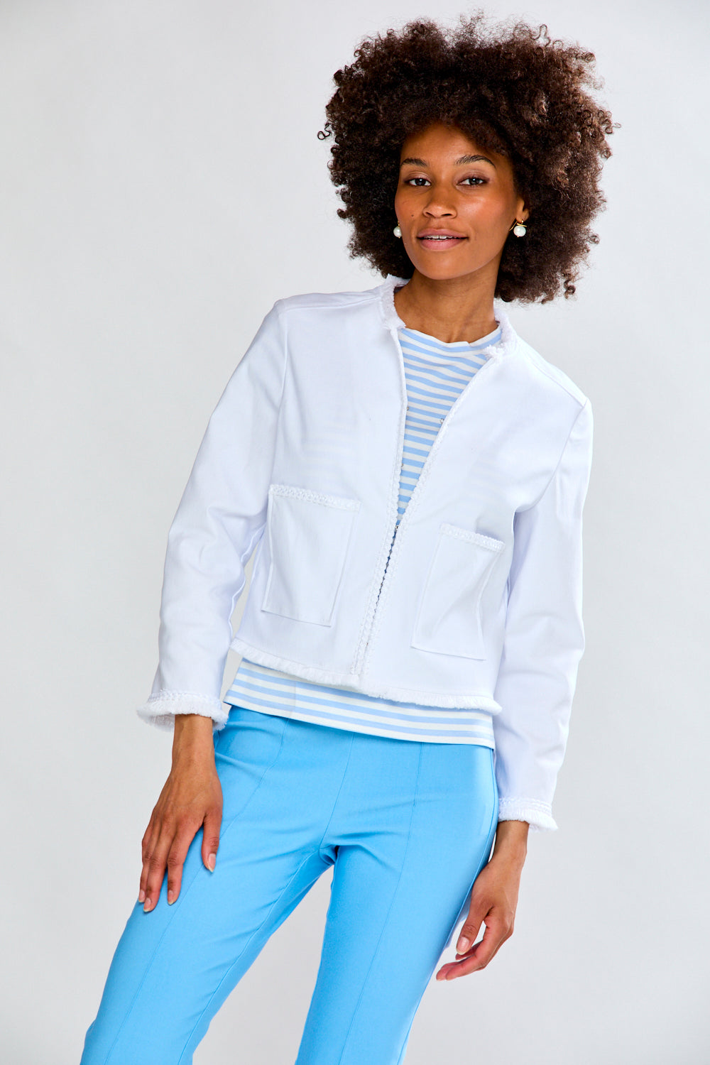 Woman in white fringe jacket