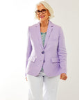 Woman in lavender jacket