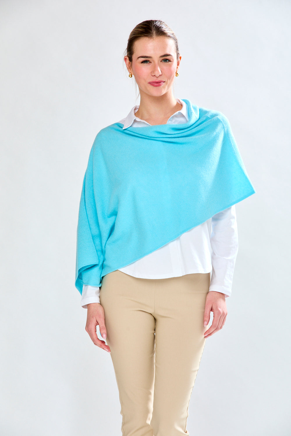 woman in light aqua wrap