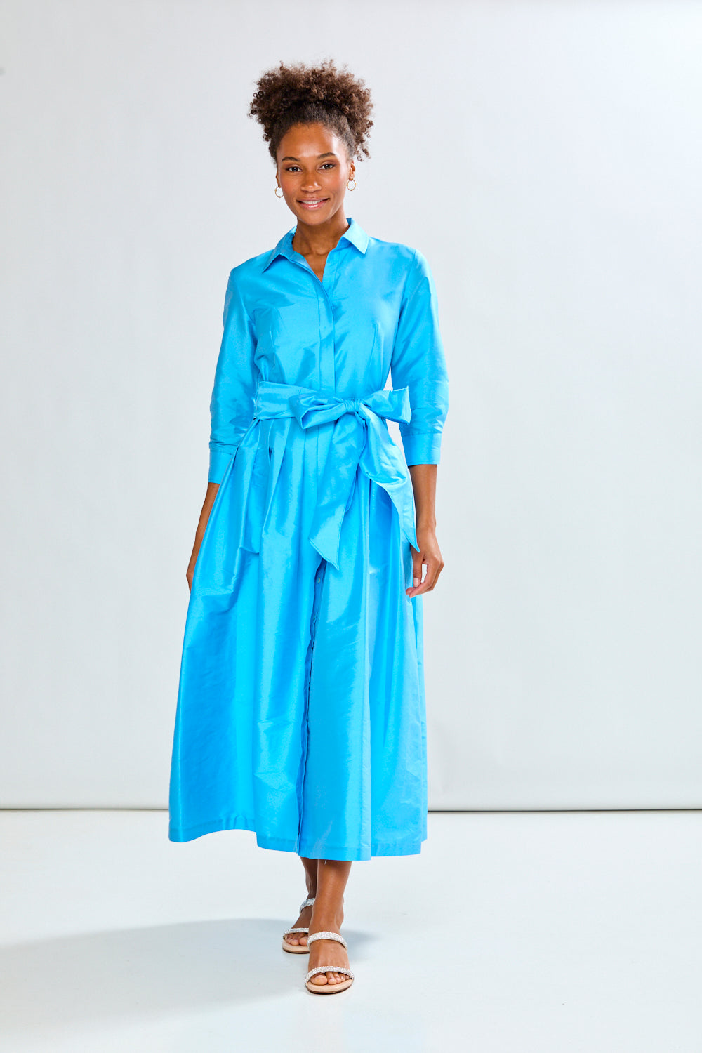 Woman in capri long taffeta dress