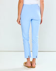 Light blue pants worn by a person on a white background