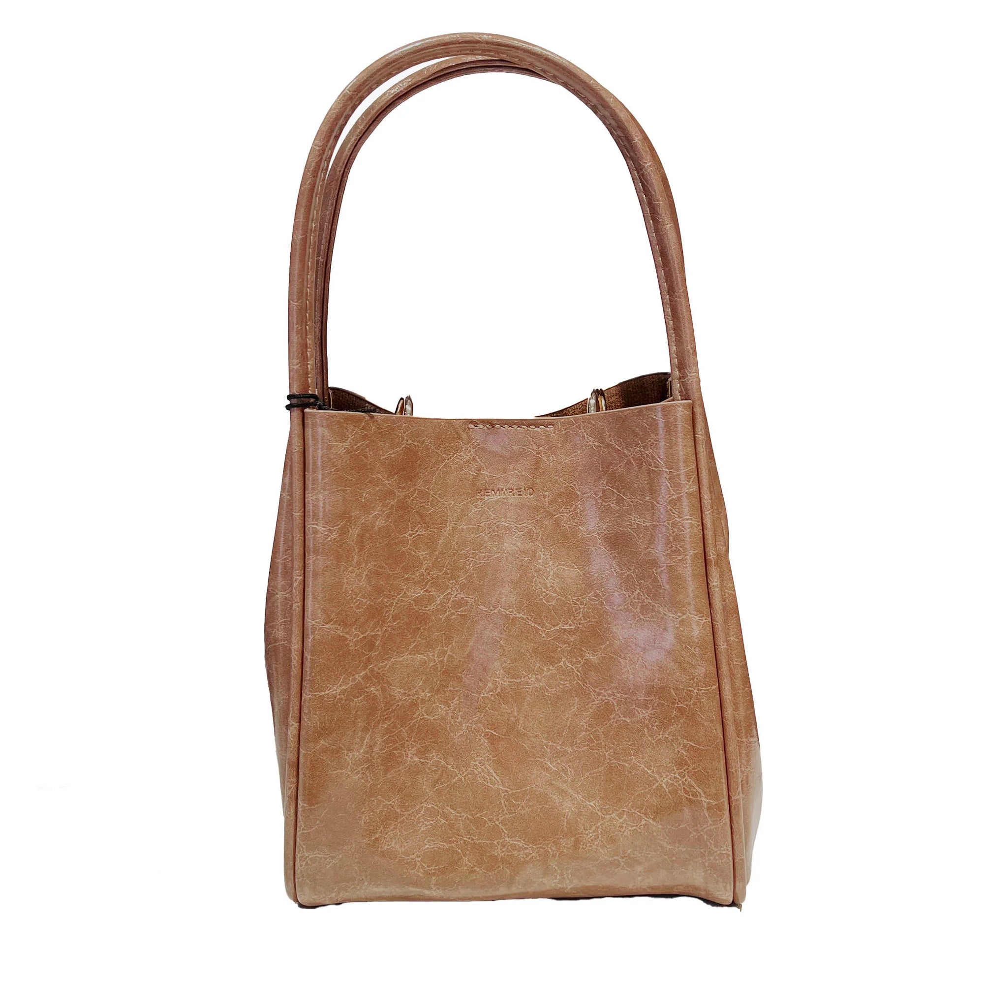 A brown waxed tote handbag with a structured design and dual handles.