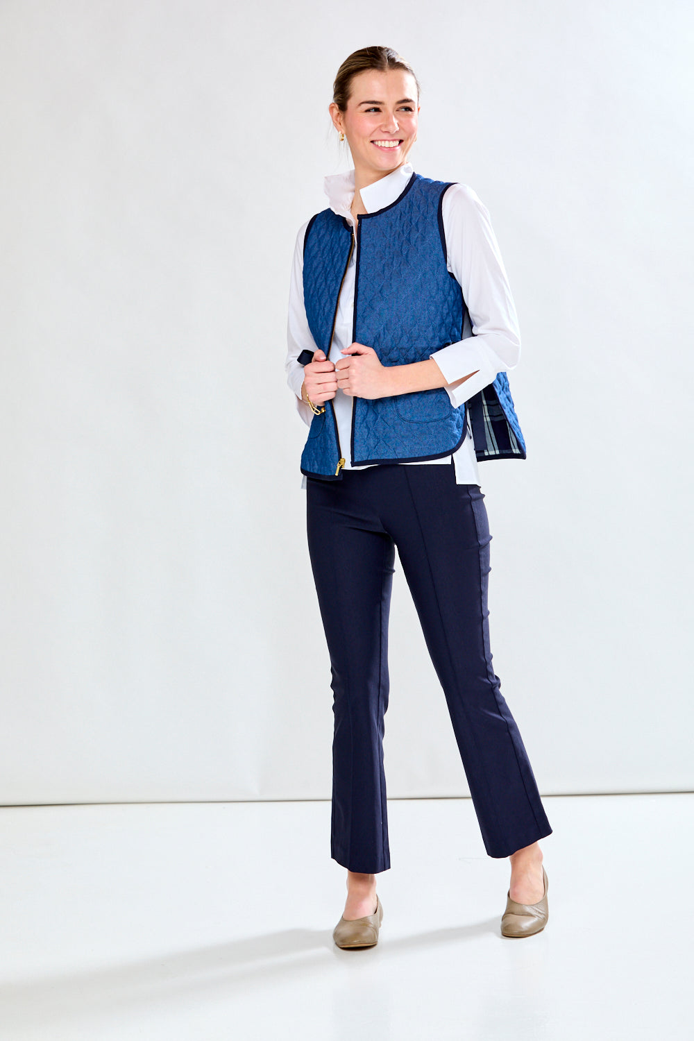 Woman in quilted vest