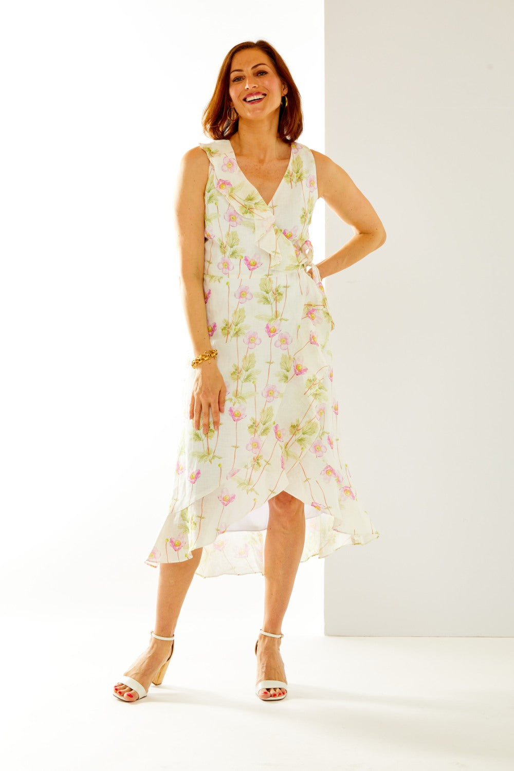 Woman in floral wrap dress