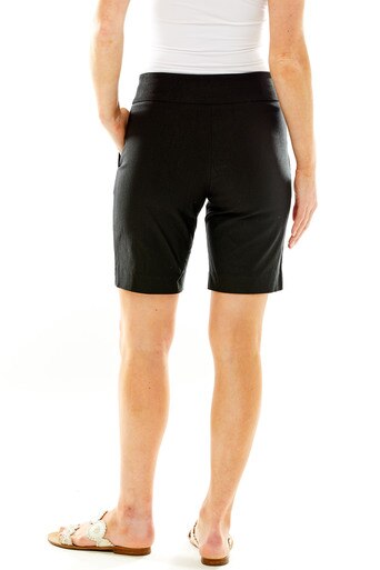 Woman in fitted Bermuda shorts