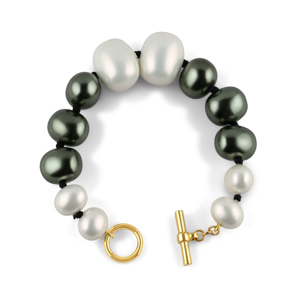 Pearl bracelet with gold clasp on a white background