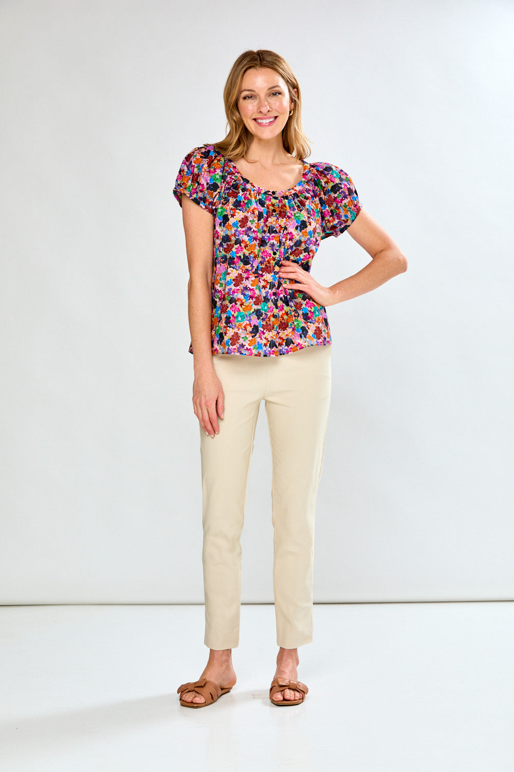 Woman in multi print blouse