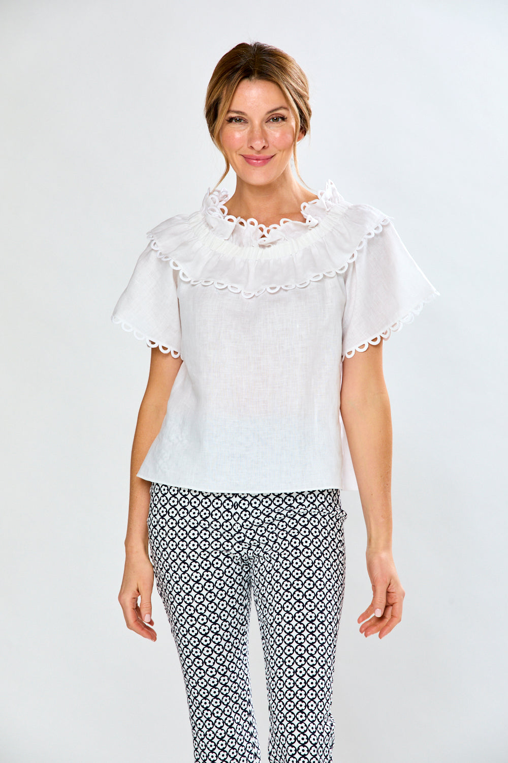 Woman in white linen blouse
