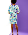 Woman in blue floral dress