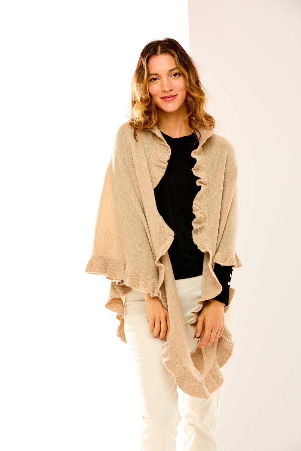 Woman wearing a beige ruffle triangle wrap