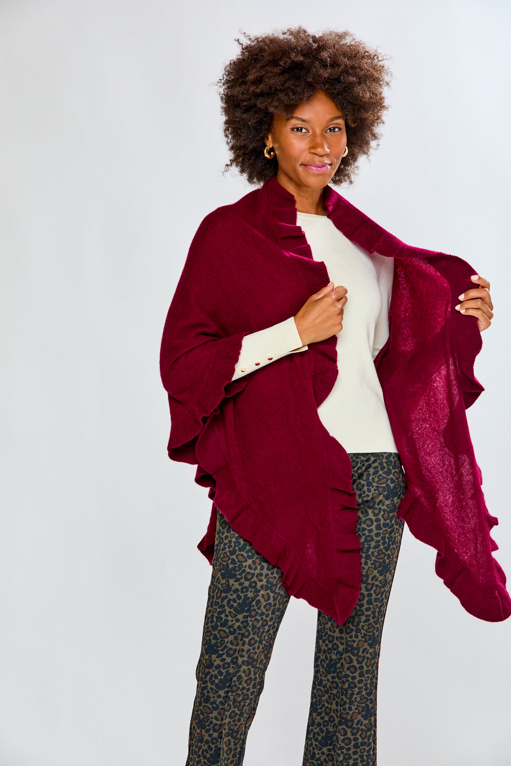 Woman wearing a raisin ruffle cashmere wrap