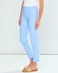 Light blue pants worn by a person on a white background