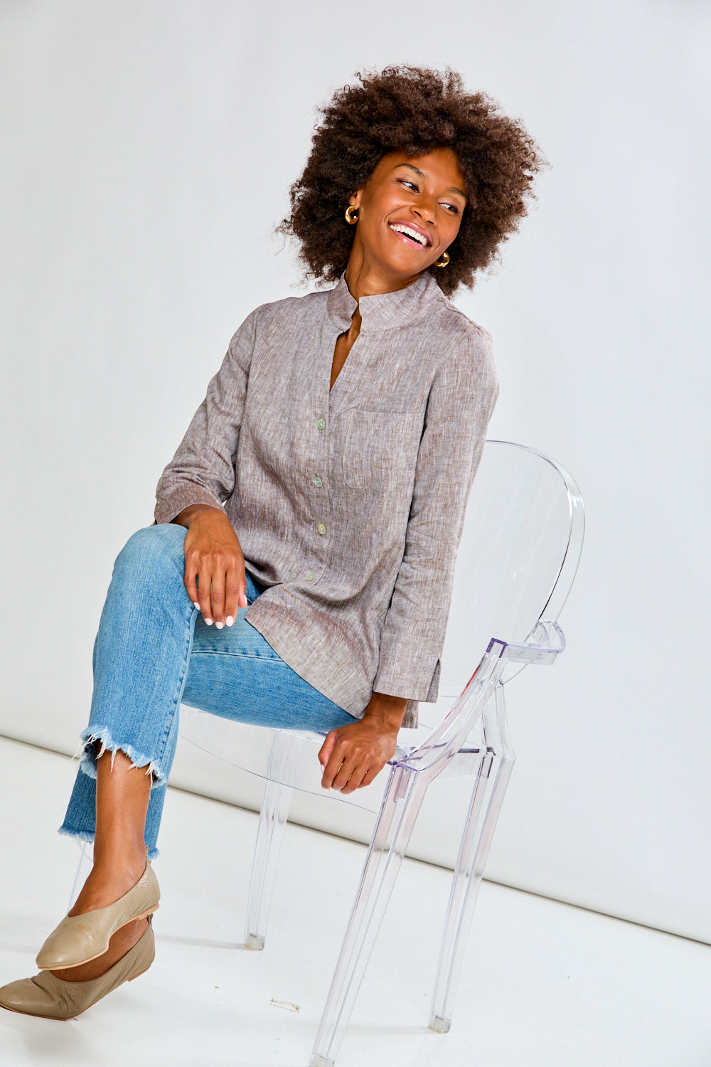 Woman in mocha linen top with jeans