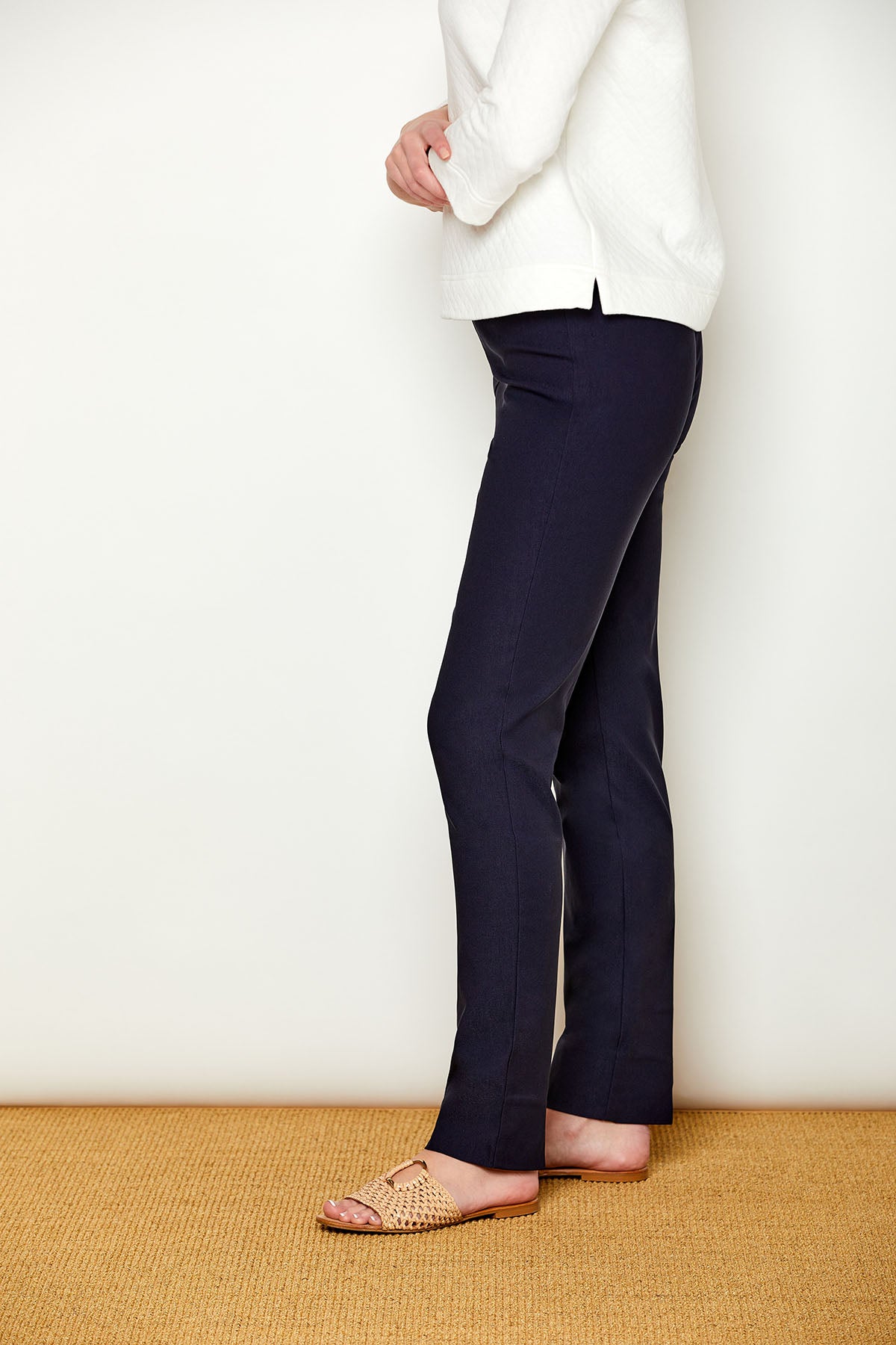 Woman in fitted long pants