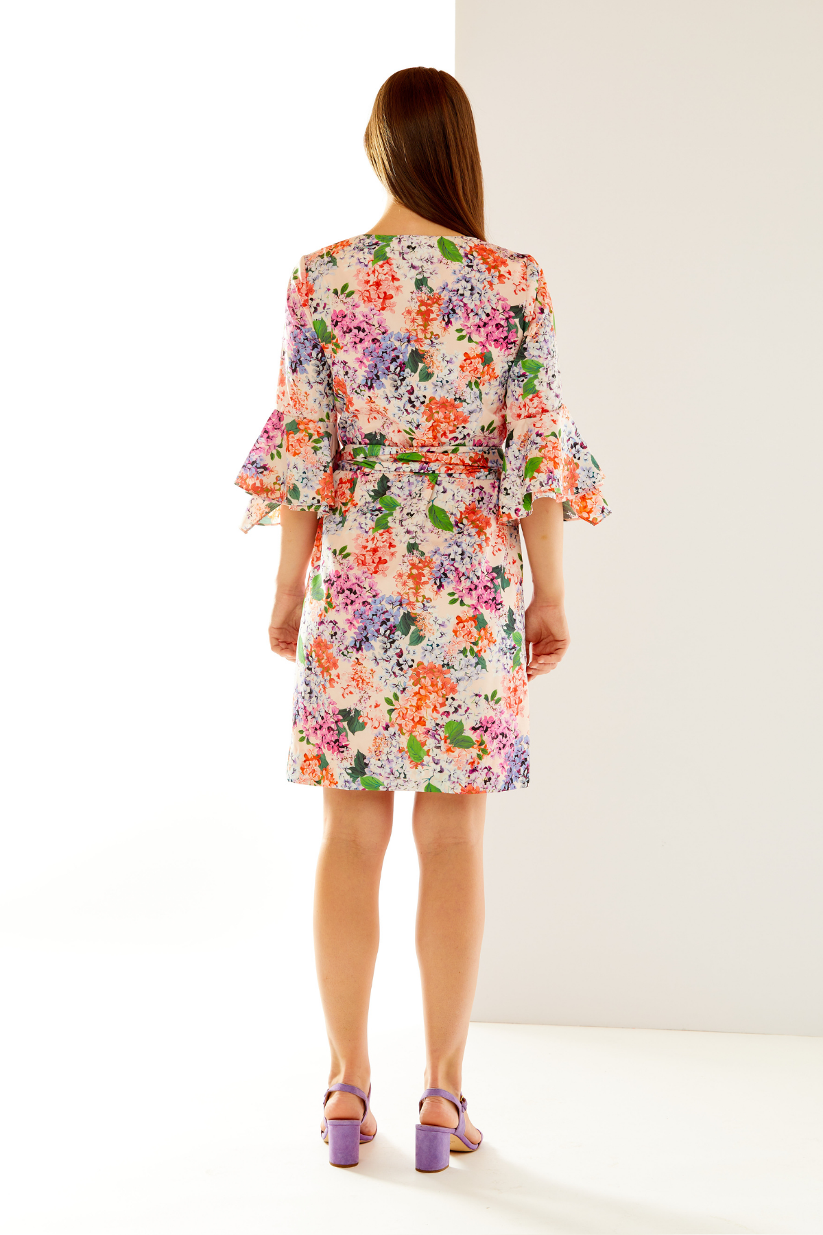 Woman in floral blossom dress