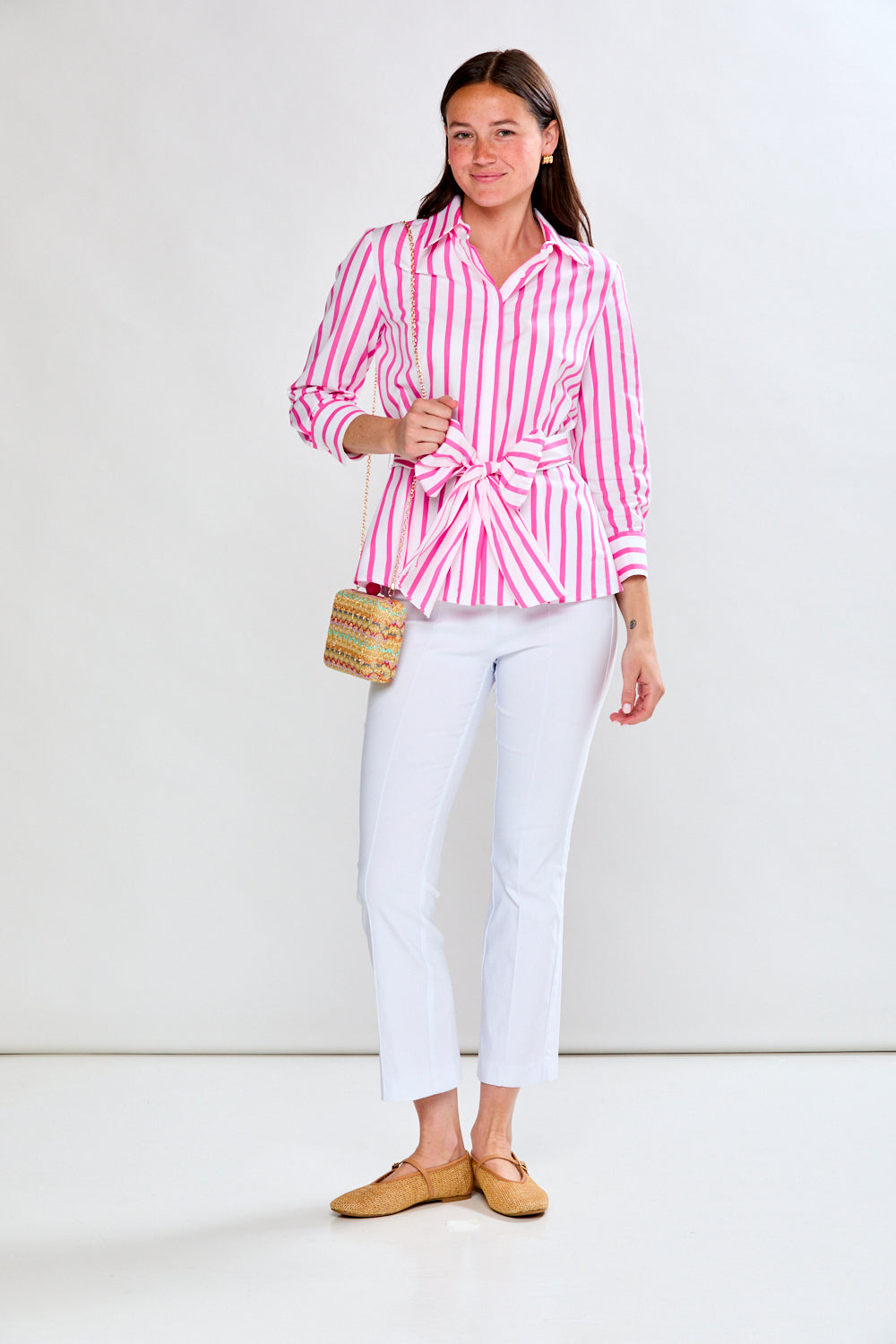 Woman in pink/white stripe top