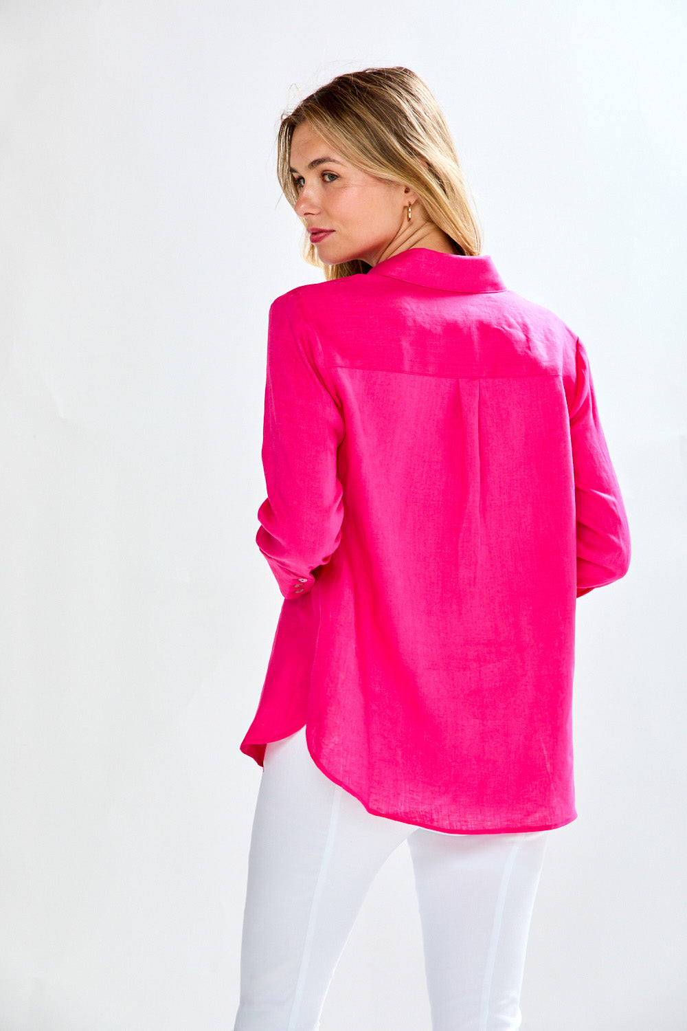 Woman in fuschia blouse