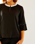 Woman in crepe blouse