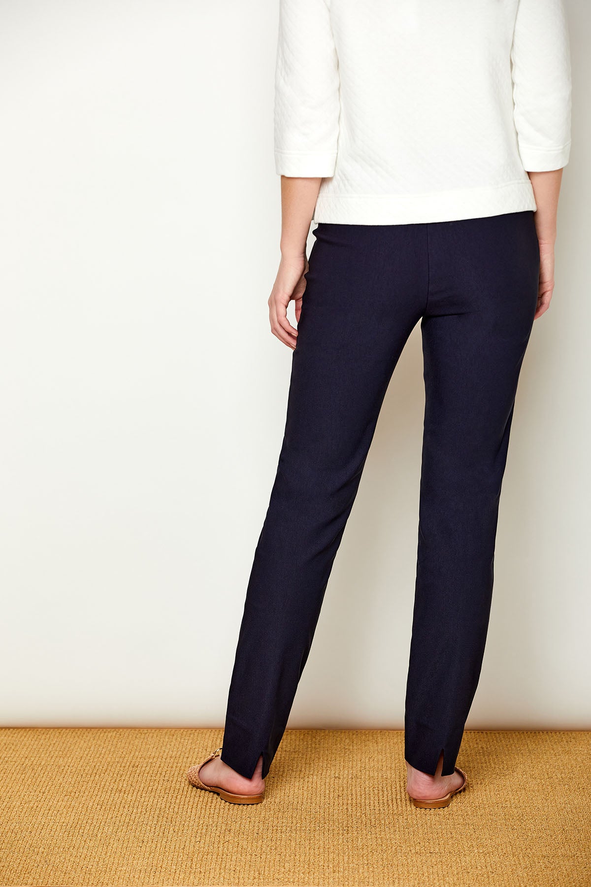 Woman in fitted long pants