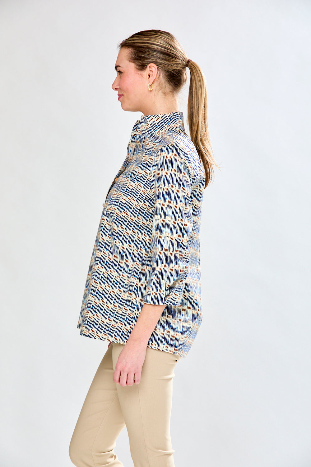 Woman in stripe tunic