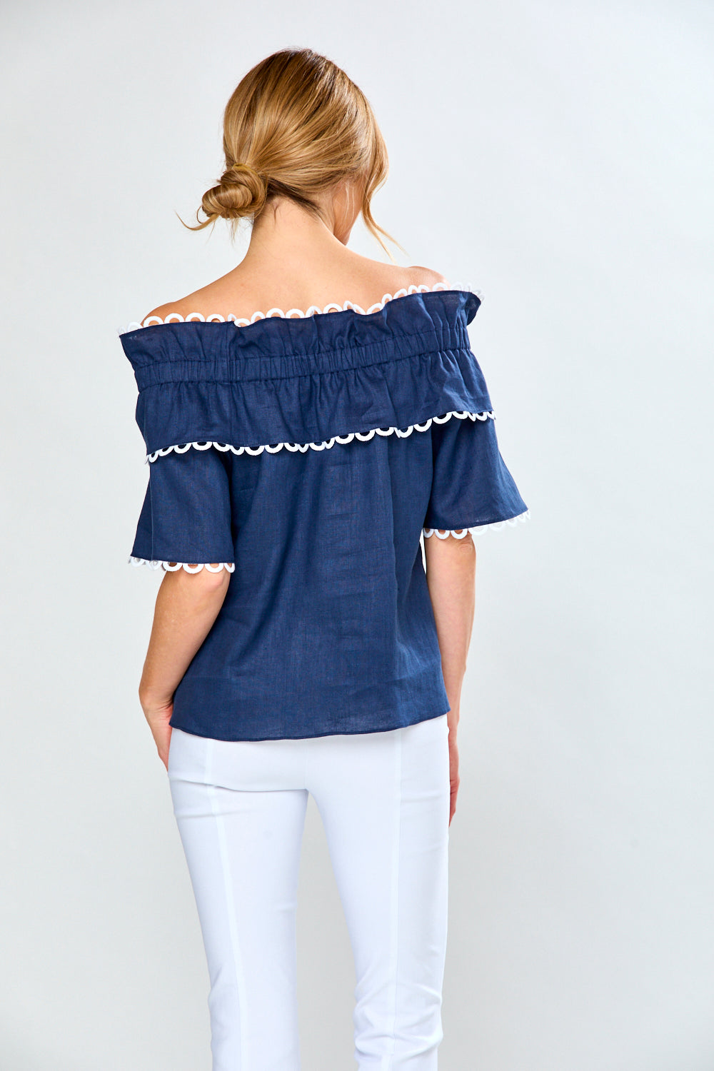 Woman in navy linen blouse