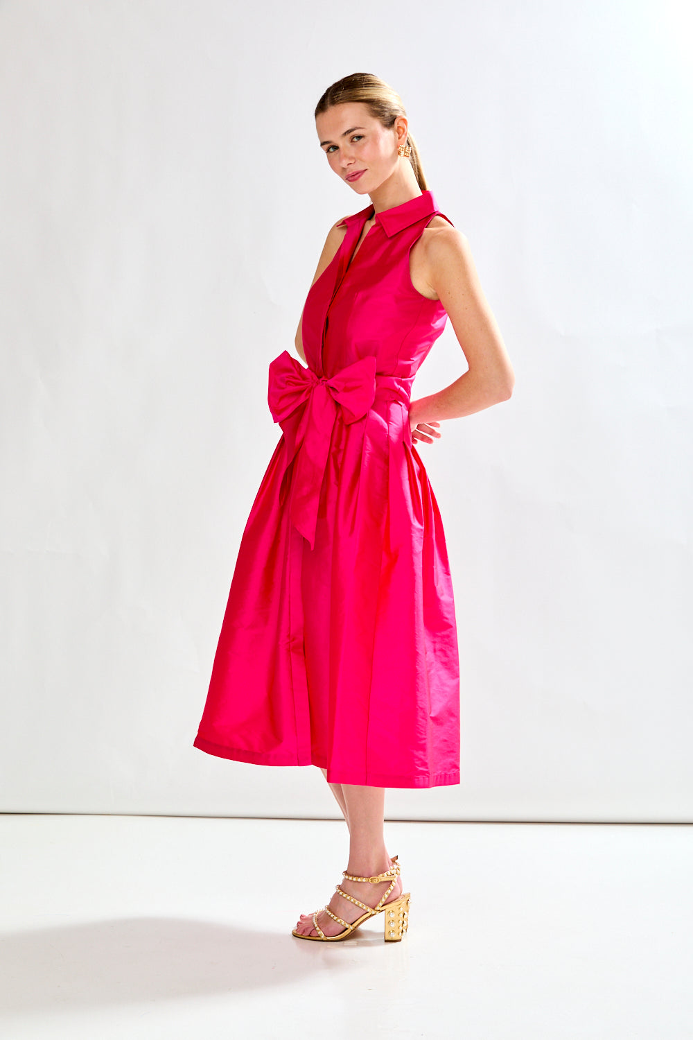 Woman in fuschia dress
