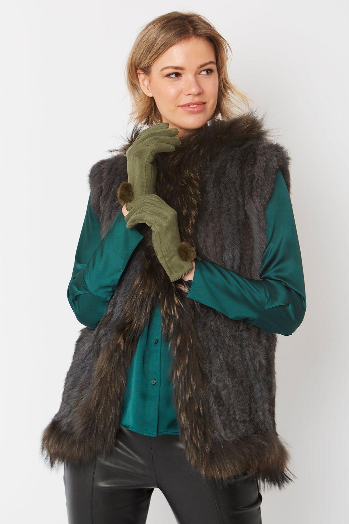 Woman in green faux suede faux fur gloves