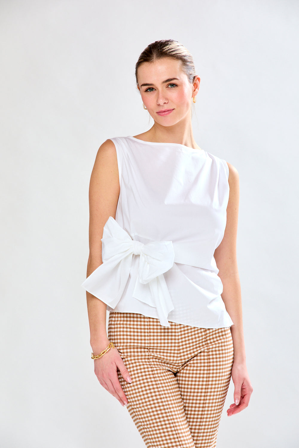 Woman in white cotton blouse
