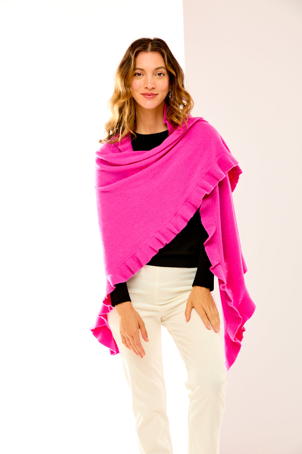 Woman in fuchsia cashmere triangle wrap