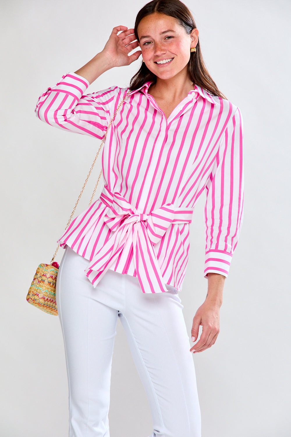 Woman in pink/white stripe top