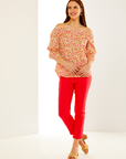 The Sheri Pant with a Mini Ruffle Hem Detail in Coral