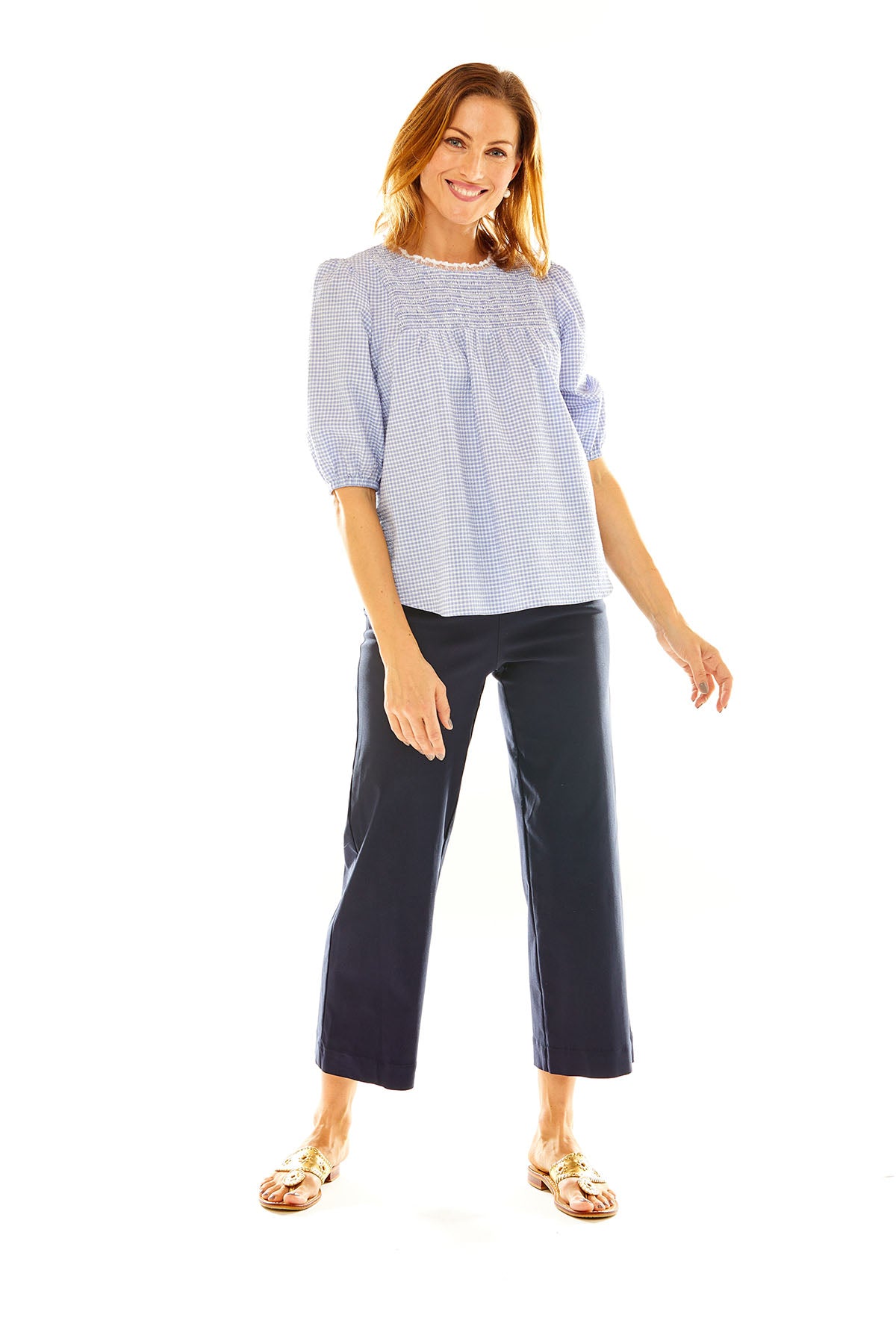 Woman wearing navy pants
