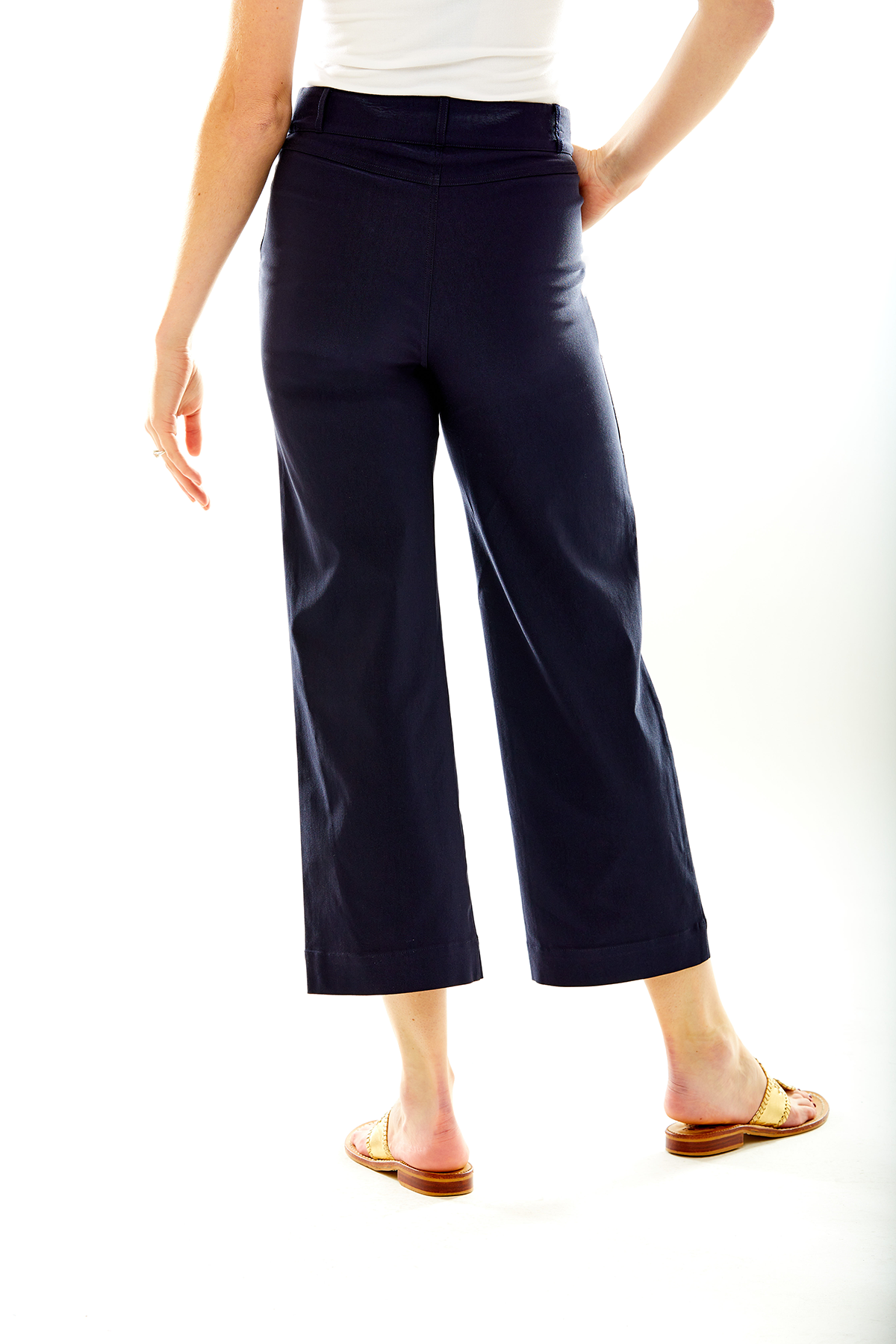 Woman wearing navy pants