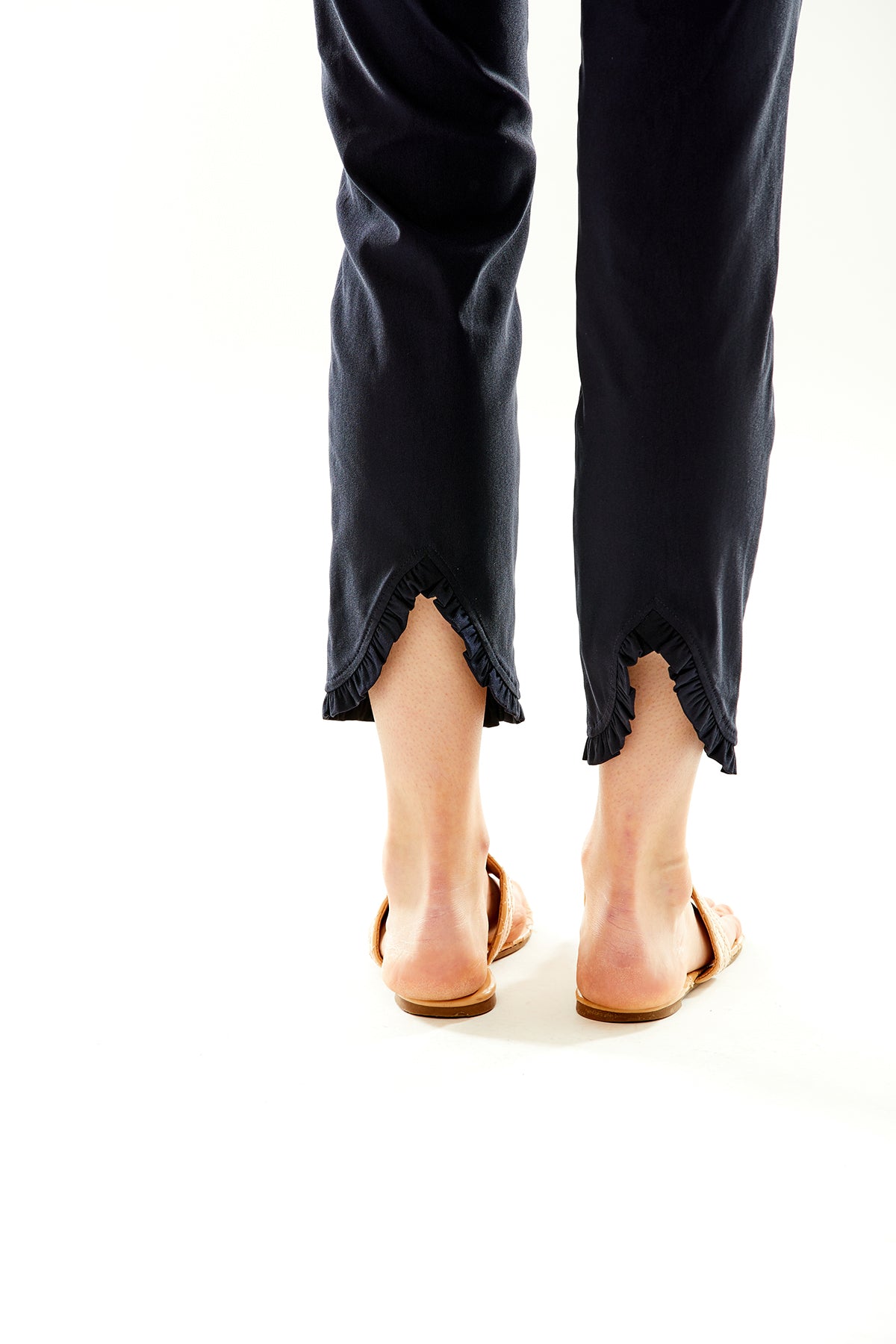 The Sheri Pant with a Mini Ruffle Hem Detail in Navy