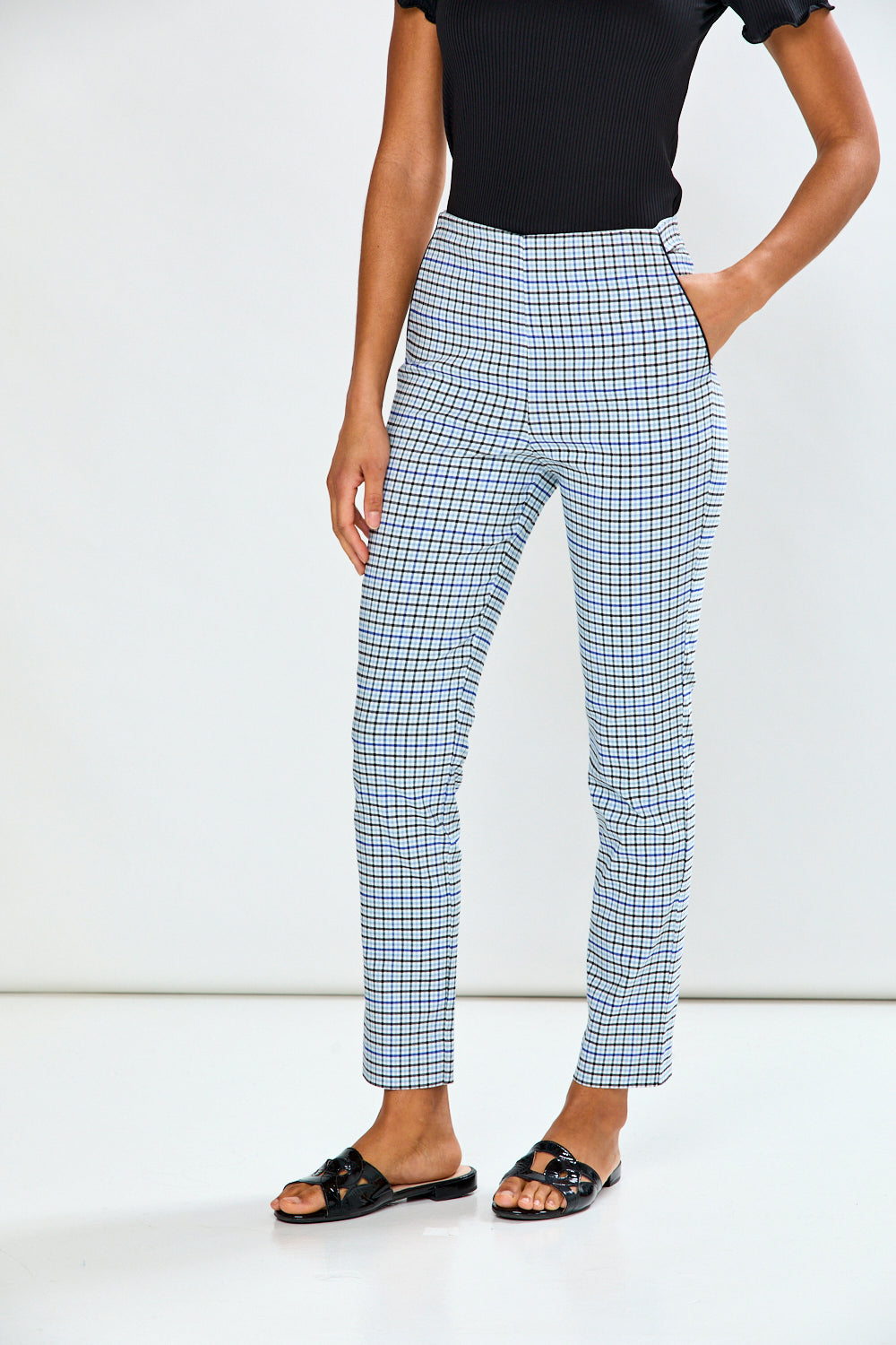 Woman in plaid pant