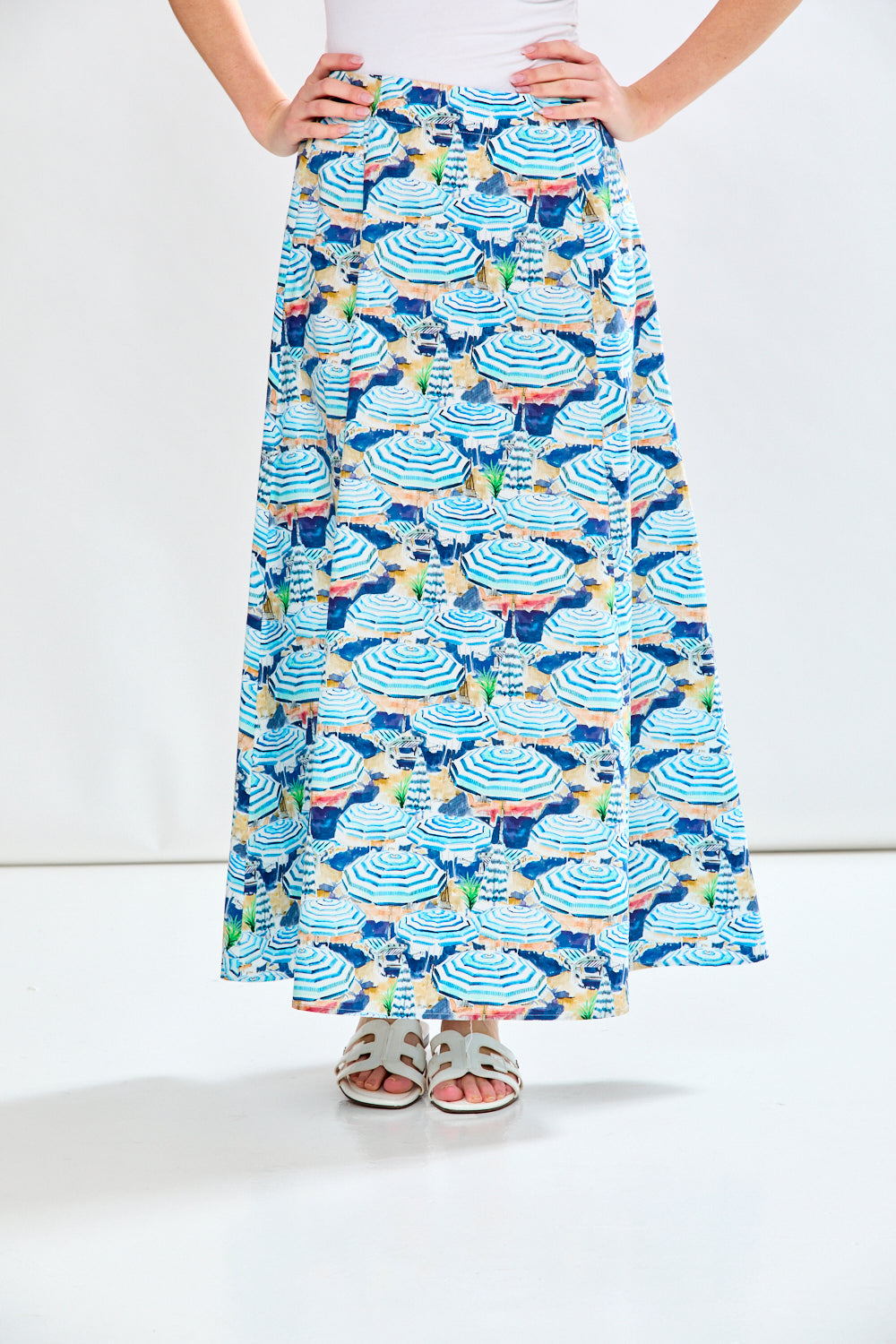 Woman in blue printed skirt