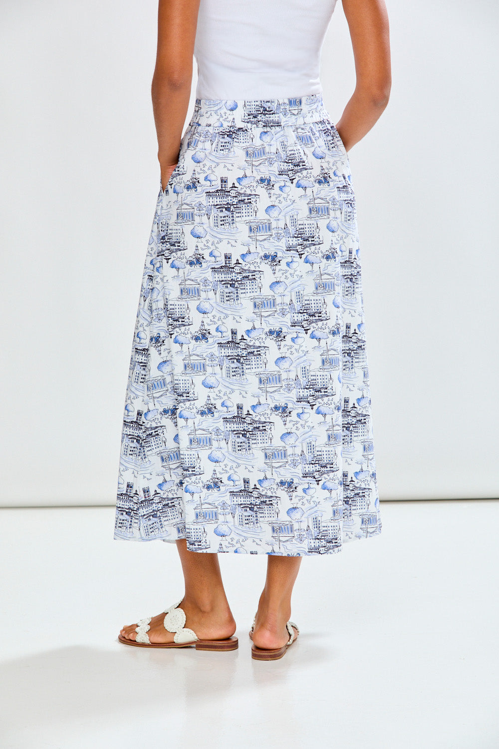 Woman wearing a blue patterned skirt 