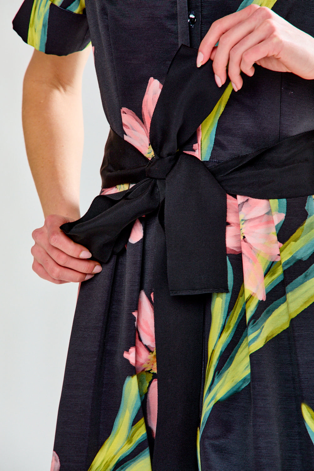 Woman wearing MARISOL DRESS IN FLORAL COSMOS - FLORAL COSMOS