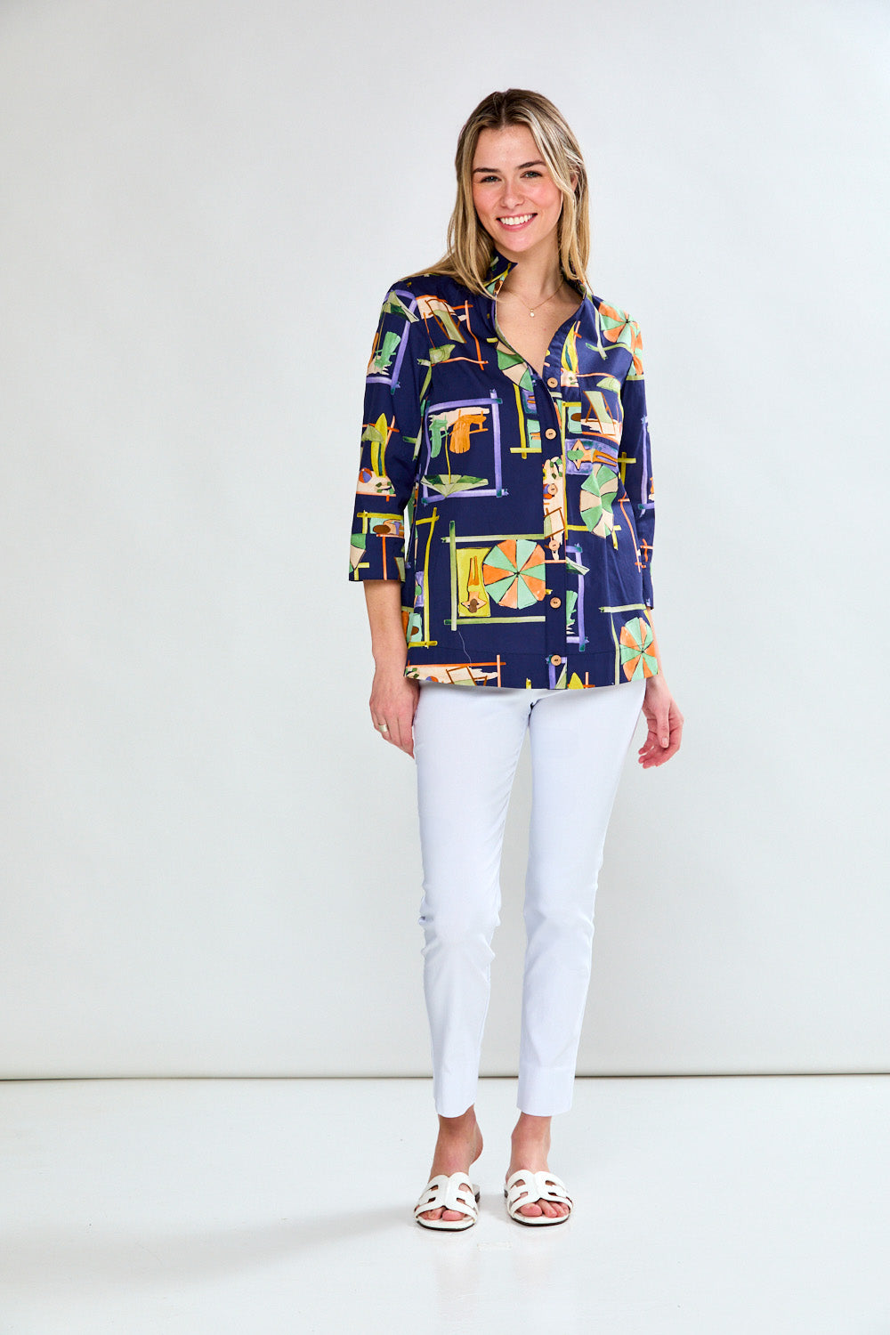 Woman in navy printed blouse