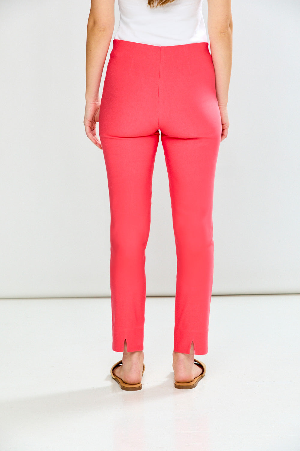 Person wearing Guava pants on a white background