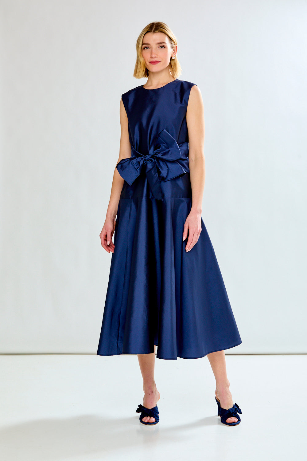 woman in navy dress