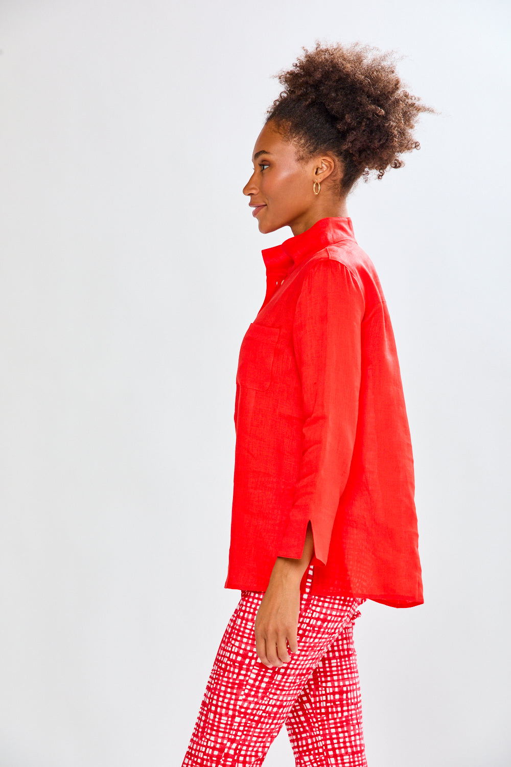 Tomato colored shirt on a women