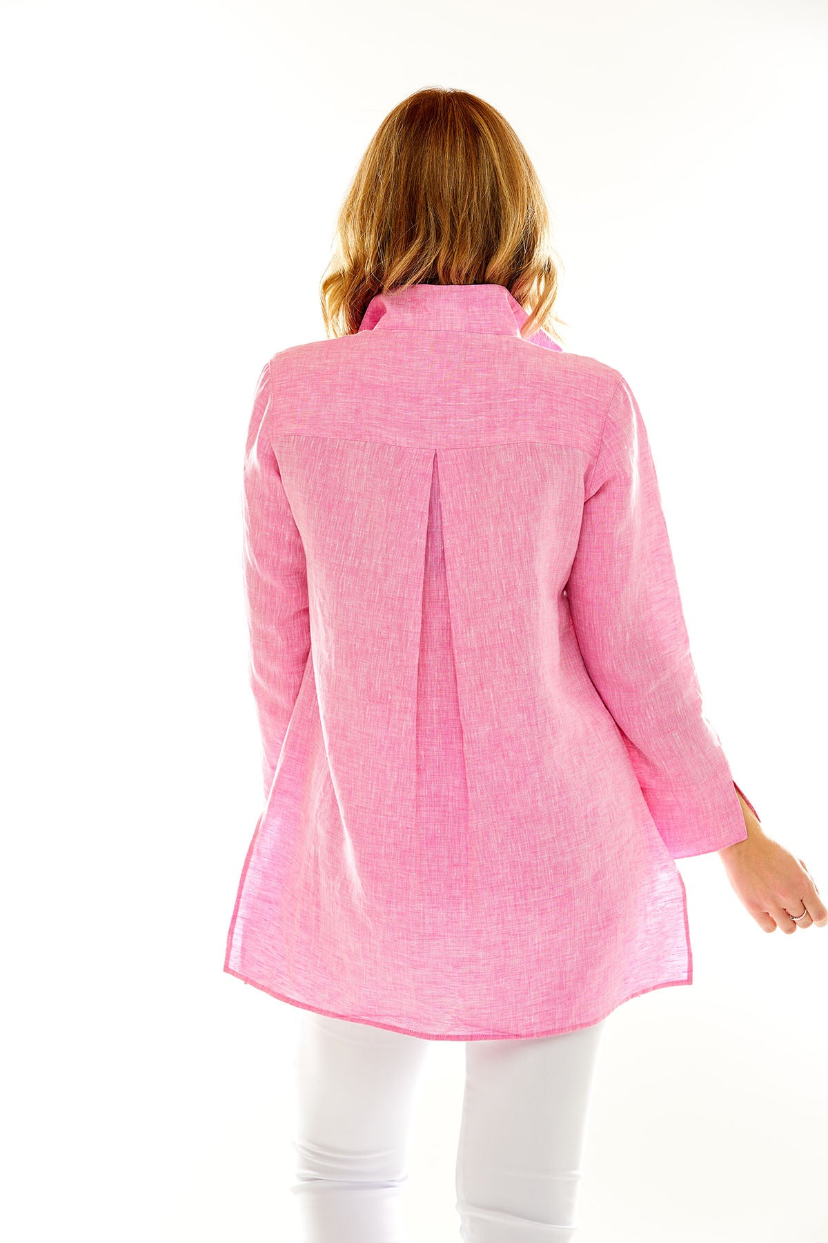 Woman in pink tunic