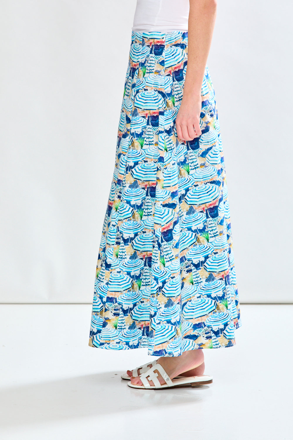 Woman in blue printed skirt