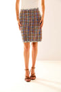 Woman in multi tweed skirt