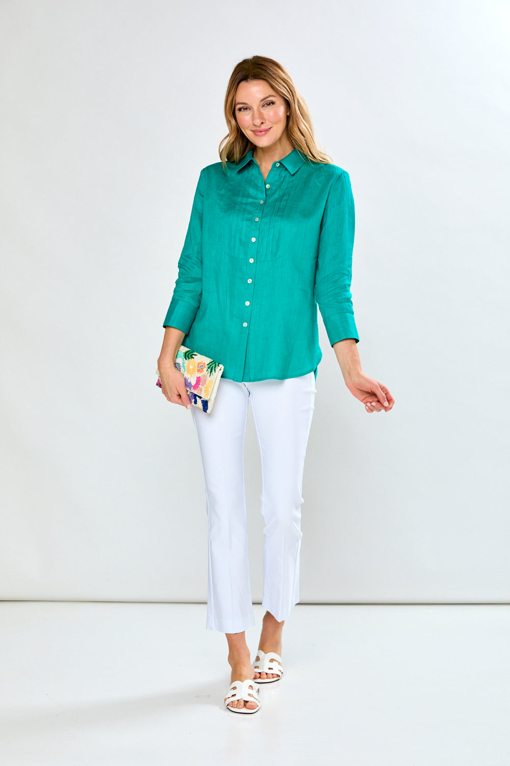 Woman in teal blouse