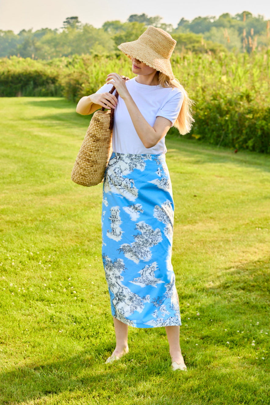 Woman wearing a blue toile skirt